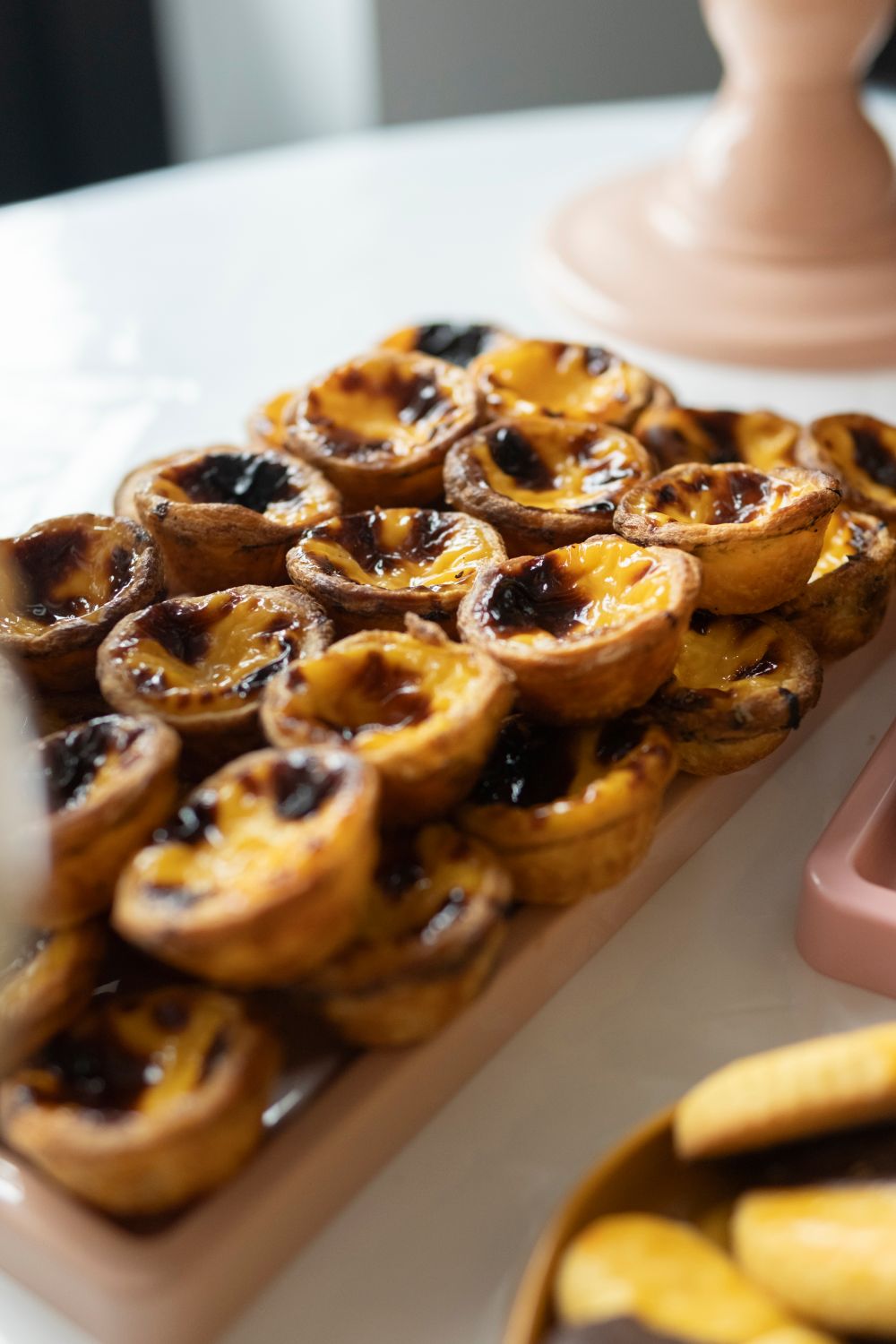 Pastéis de nata with blistered golden tops